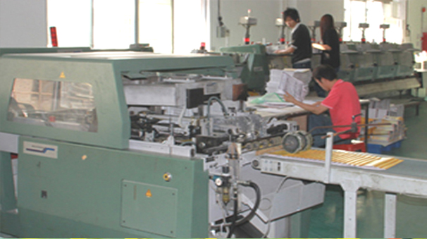 Saddle stitching machine